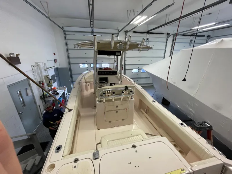 Slide: The Image of 2010 Grady-White 257 Advance boat in a garage, viewed from above. - 29