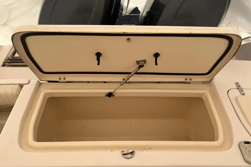 Slide: The Image of Open storage compartment on 2010 Grady-White 257 Advance boat. - 34