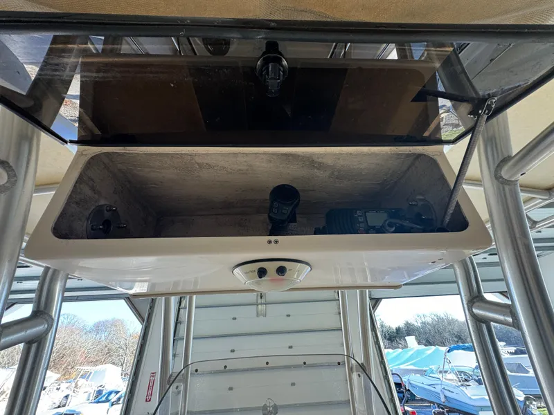 Slide: The Image of 2010 Grady-White 257 Advance boat console storage compartment. - 38