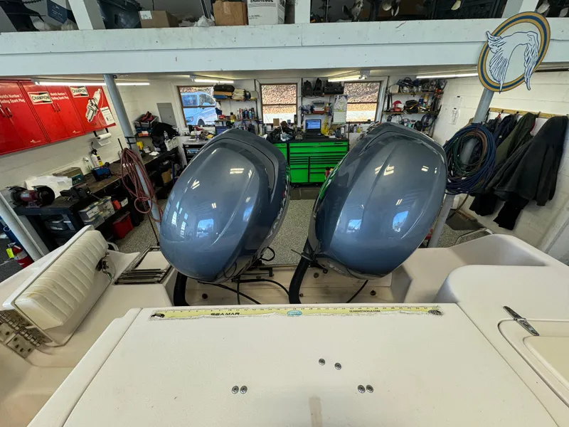 Slide: The Image of 2010 Grady-White 257 Advance boat engines in a workshop setting. - 42