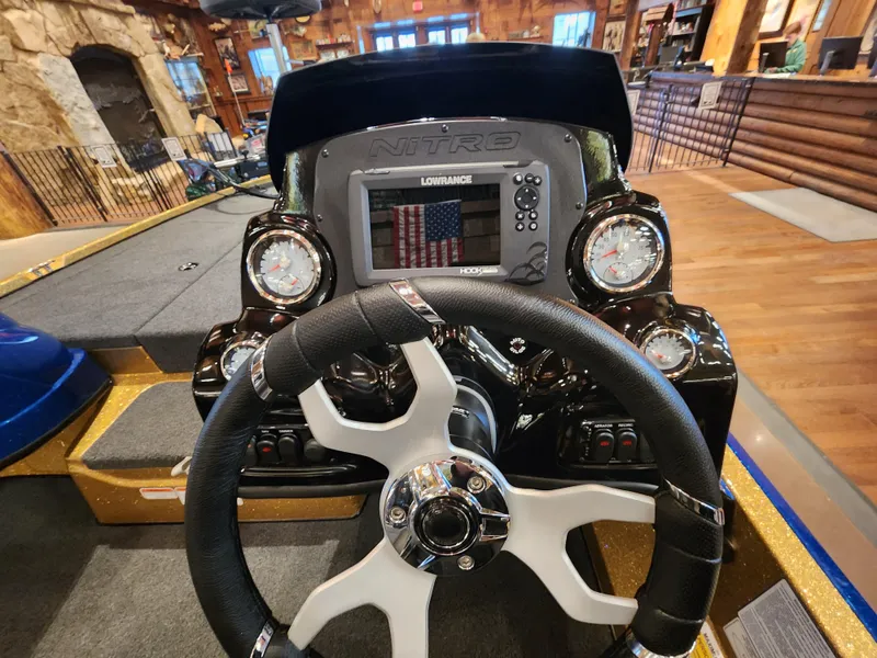 Slide: The Image of Steering console of a 2023 Nitro Z17 boat with Lowrance electronics. - 5