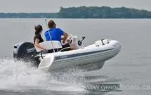 Slide: The Image of 2023 Grand G 340 w/ DF25ATSW inflatable boat speeding on water. - 8