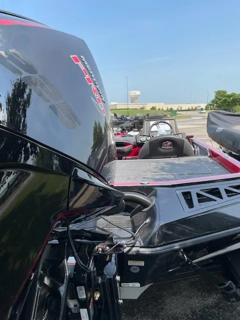 Slide: The Image of 2023 Ranger Z519 boat with powerful engine, sleek design, and modern features. - 2