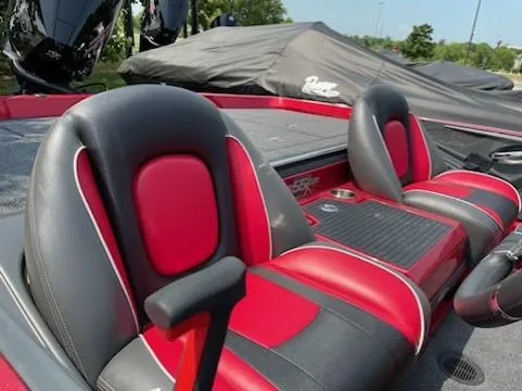Slide: The Image of 2023 Ranger Z519 boat with red and black seats, showcasing modern design and comfort. - 4