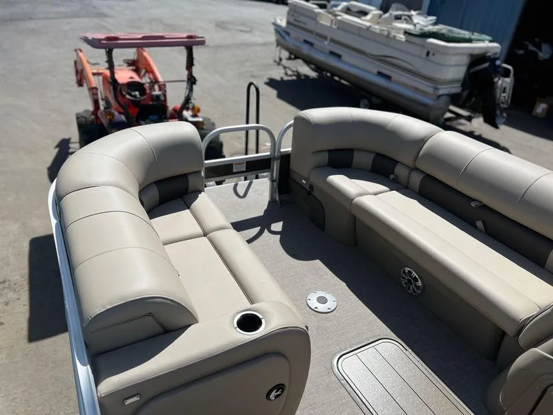 Slide: The Image of 2023 Sun Tracker SportFish™ 22 XP3 pontoon boat interior with beige seating. - 19