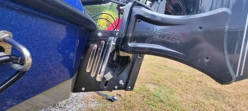 Slide: The Image of 2023 Ranger Z 521 RC boat motor mount detail on grass. - 15