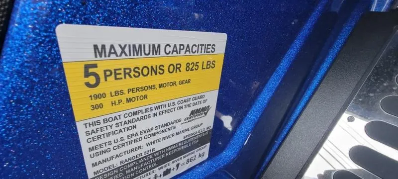 Slide: The Image of 2023 Ranger Z 521 RC capacity label, 5 persons or 825 lbs, blue background. - 16