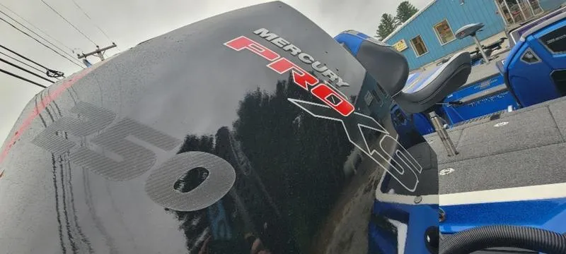 Slide: The Image of 2023 Ranger Z 521 RC with Mercury Pro XS 250 engine, blue exterior. - 26