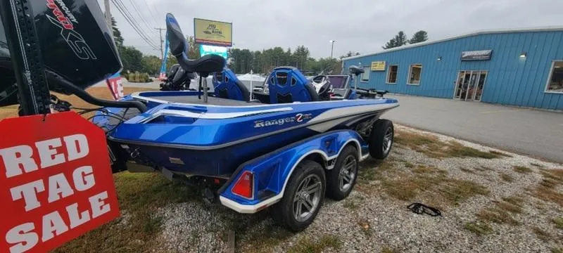 Slide: The Image of 2023 Ranger Z 521 RC boat on sale, blue exterior, displayed outdoors. - 8
