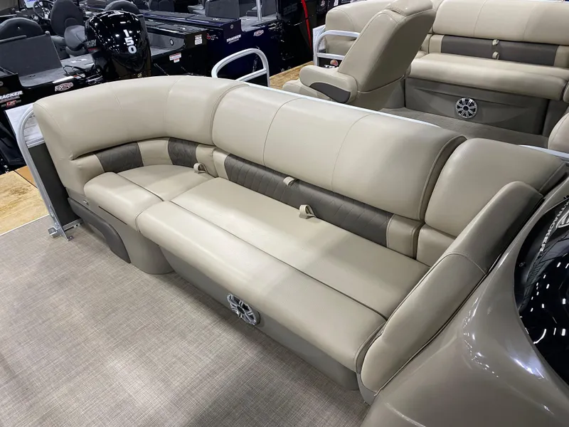 Slide: The Image of 2023 Sun Tracker Party Barge 20 DLX interior seating, beige and brown upholstery. - 5