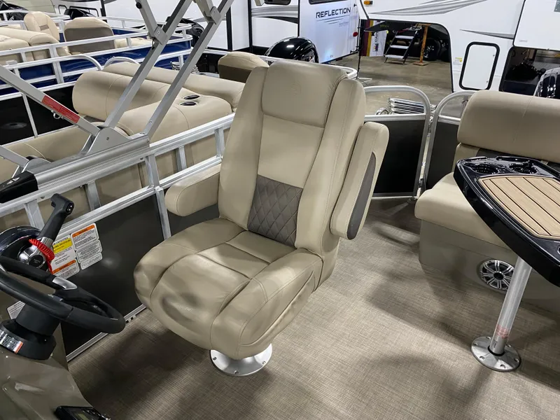 Slide: The Image of 2023 Sun Tracker Party Barge 20 DLX captain's chair and helm station. - 7