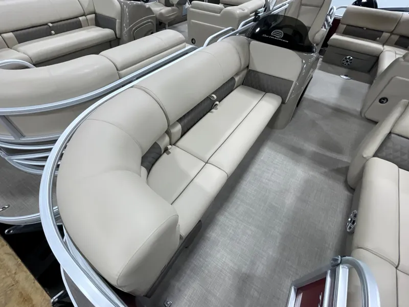 Slide: The Image of 2023 Sun Tracker Party Barge 20 DLX with beige seating and spacious interior. - 3
