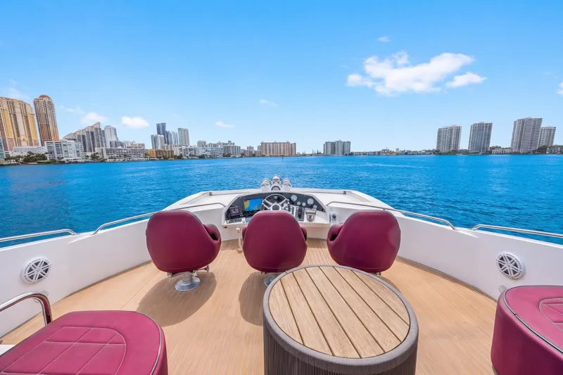 Slide: The Image of Luxurious Sunseeker Predator 84 yacht helm with city skyline view, 2013 model. - 18