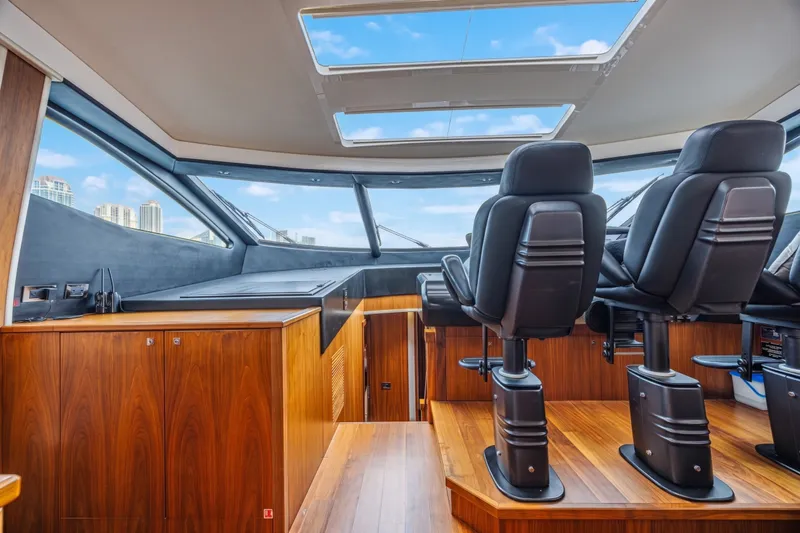 Slide: The Image of Interior of 2013 Sunseeker Predator 84 yacht with modern helm and panoramic windows. - 36
