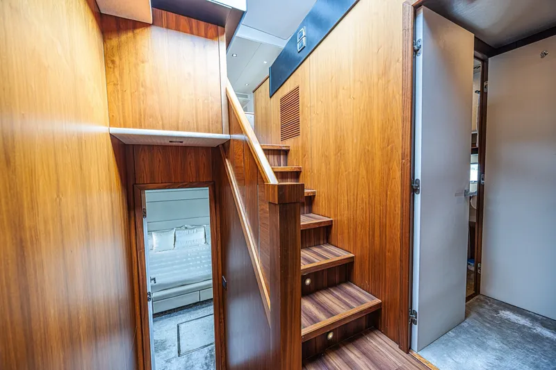 Slide: The Image of Luxurious wooden staircase interior of 2013 Sunseeker Predator 84 yacht. - 59