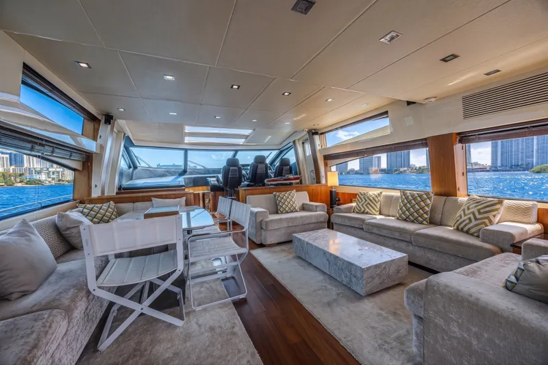 Slide: The Image of Luxurious interior of 2013 Sunseeker Predator 84 yacht with elegant seating and panoramic windows. - 29