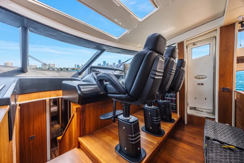Slide: The Image of Luxurious interior of 2013 Sunseeker Predator 84 yacht with modern helm and seating. - 35