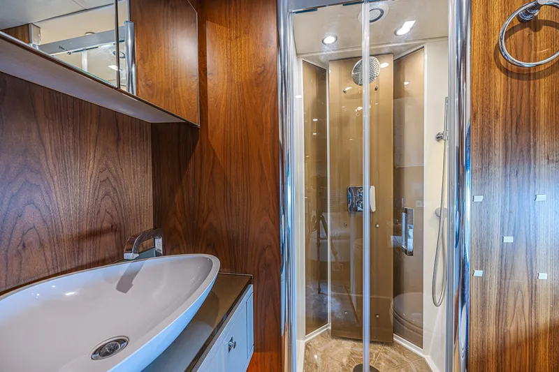Slide: The Image of Luxurious bathroom on 2013 Sunseeker Predator 84 yacht with modern shower and sleek sink. - 55