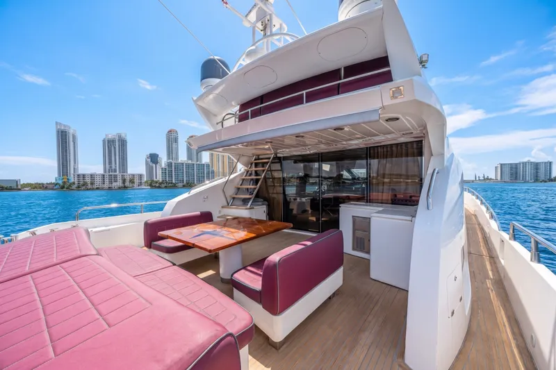 Slide: The Image of Luxurious 2013 Sunseeker Predator 84 yacht deck with city skyline view. - 15