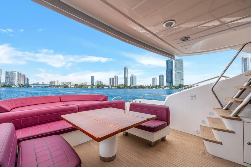 Slide: The Image of Luxurious Sunseeker Predator 84 yacht deck with city skyline view, 2013 model. - 16