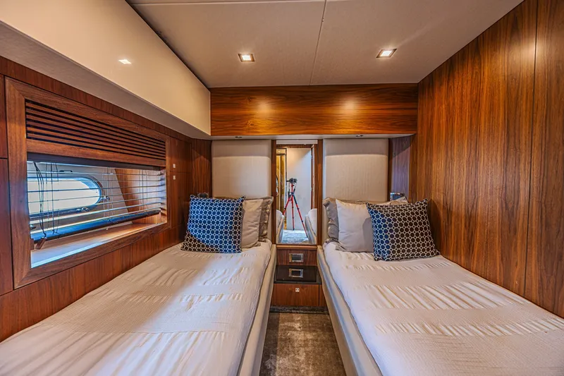Slide: The Image of Luxurious twin cabin interior of 2013 Sunseeker Predator 84 yacht with wood paneling. - 54