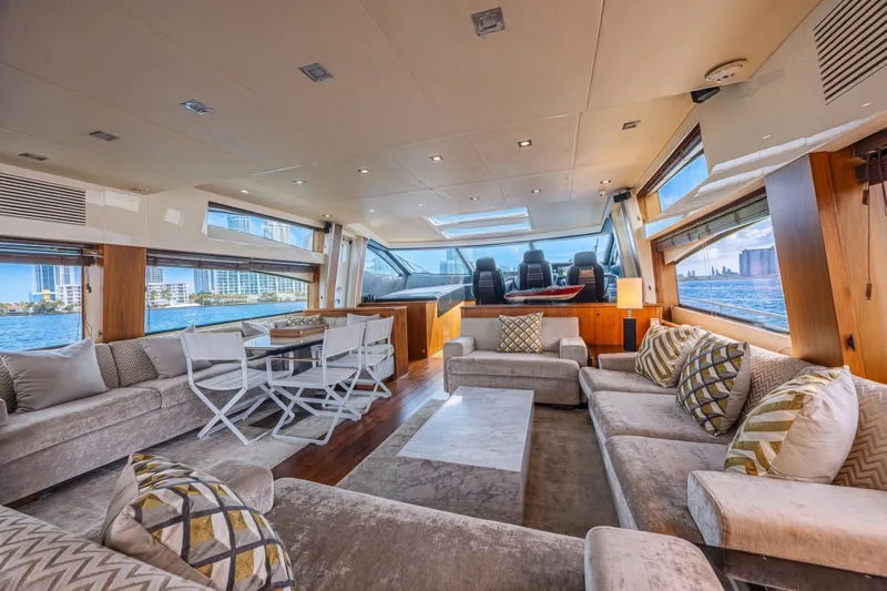 Slide: The Image of Luxurious interior of 2013 Sunseeker Predator 84 yacht with elegant seating and panoramic windows. - 34