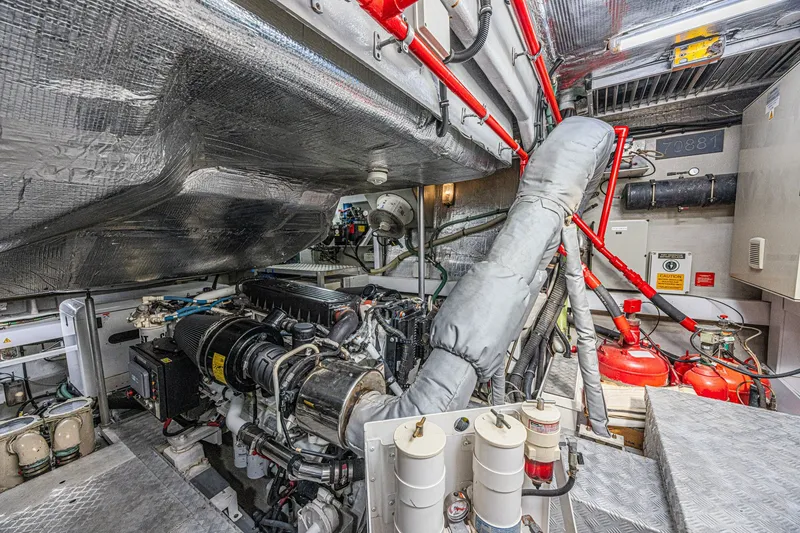 Slide: The Image of Engine room of 2013 Sunseeker Predator 84 yacht, showcasing machinery and equipment. - 65