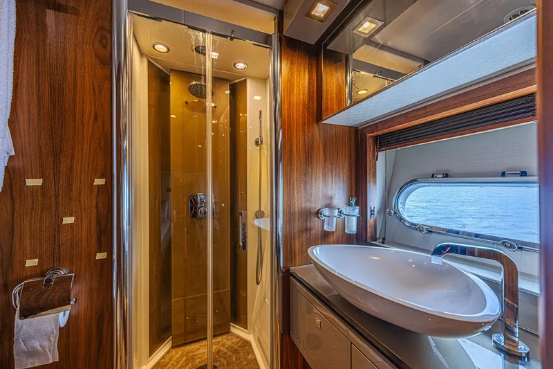 Slide: The Image of Luxurious bathroom on 2013 Sunseeker Predator 84 yacht with modern fixtures and ocean view. - 47