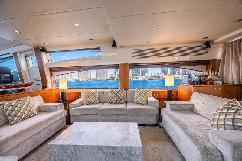 Slide: The Image of Luxurious interior of 2013 Sunseeker Predator 84 yacht with elegant seating and waterfront view. - 31