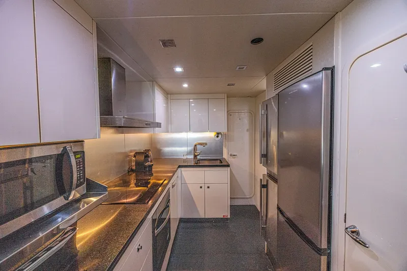 Slide: The Image of Luxurious kitchen interior of 2013 Sunseeker Predator 84 yacht with modern appliances. - 60