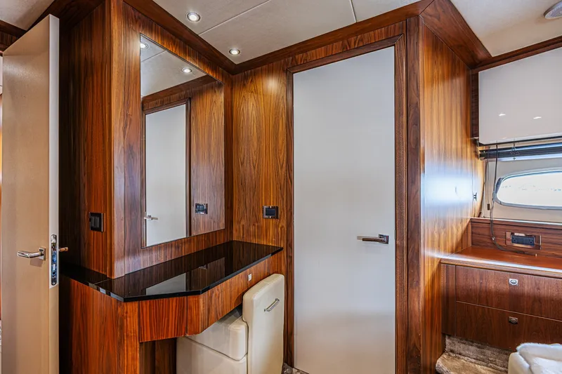 Slide: The Image of Luxurious interior of 2013 Sunseeker Predator 84 yacht with wood paneling and modern design. - 46
