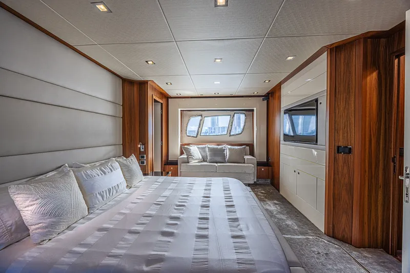 Slide: The Image of Luxurious bedroom interior of 2013 Sunseeker Predator 84 yacht with modern design elements. - 42