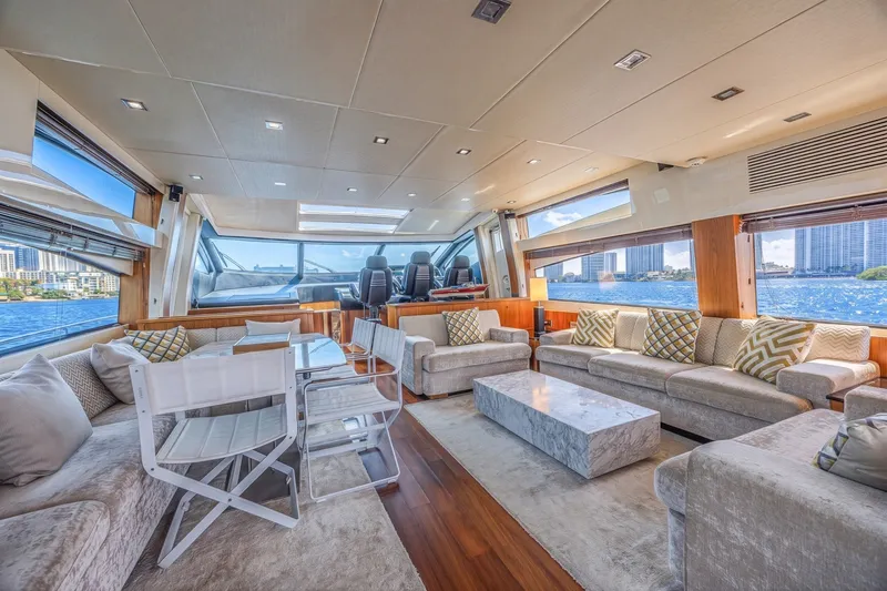 Slide: The Image of Luxurious interior of 2013 Sunseeker Predator 84 yacht with elegant seating and panoramic windows. - 32