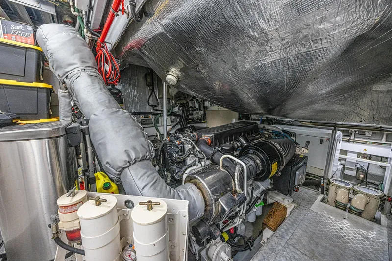 Slide: The Image of Engine room of 2013 Sunseeker Predator 84 yacht, showcasing mechanical components and equipment. - 66