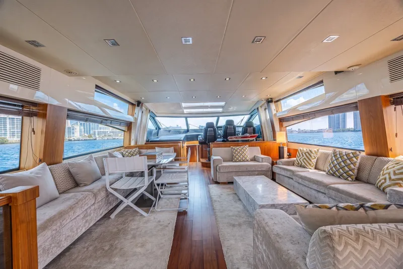 Slide: The Image of Luxurious interior of 2013 Sunseeker Predator 84 yacht with elegant seating and panoramic windows. - 33
