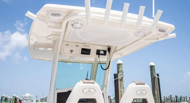 Slide: The Image of 2023 Sailfish 272 CC boat console with rod holders and electronics. - 8