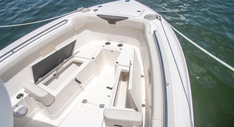 Slide: The Image of 2023 Sailfish 272 CC boat interior with open storage compartments. - 9