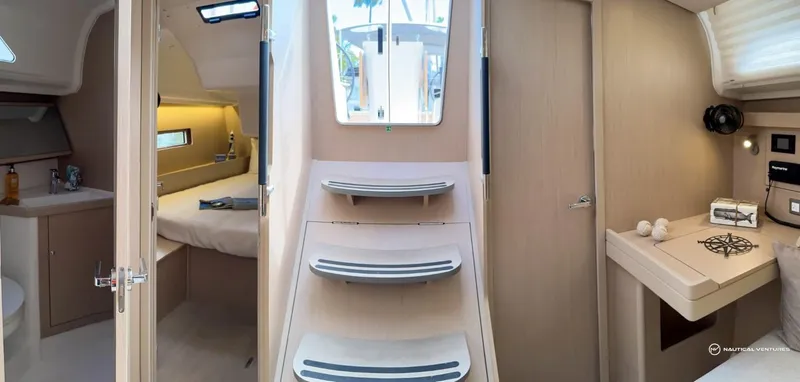 Slide: The Image of Interior of 2024 Beneteau Oceanis 40.1 sailboat, featuring modern design and cozy cabin. - 15