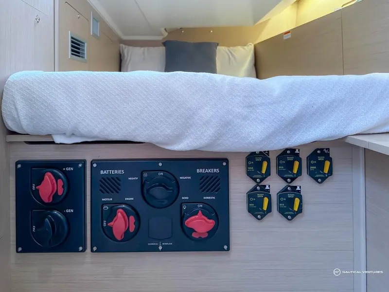 Slide: The Image of Electrical panel and bed in 2024 Beneteau Oceanis 40.1 sailboat cabin. - 25