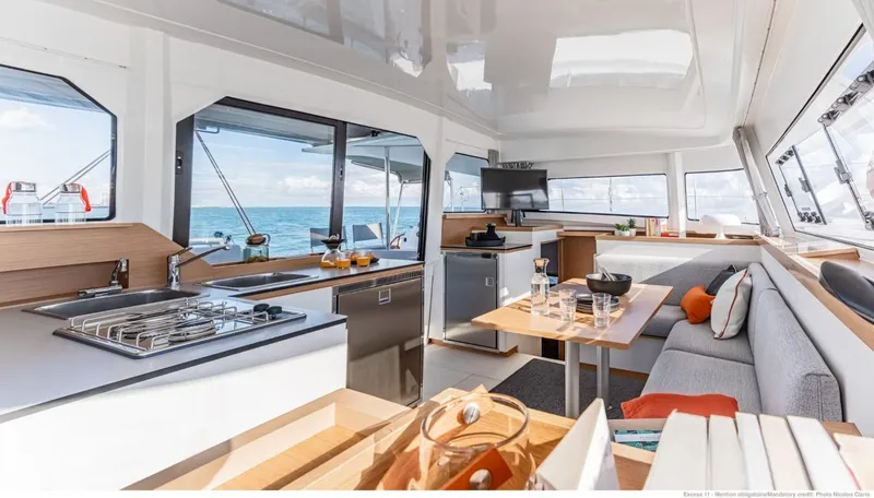 Slide: The Image of Modern interior of 2024 Excess 11 yacht with kitchen and seating area. - 15