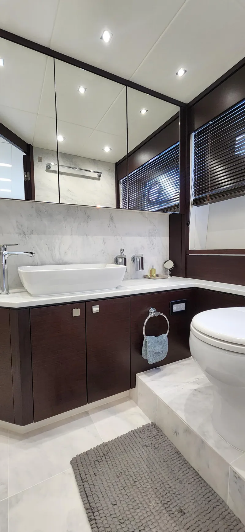 Slide: The Image of Modern bathroom in 2020 Sunseeker Predator 74 XPS yacht with sleek design. - 13