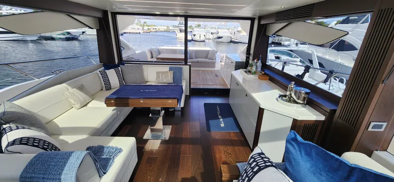 Slide: The Image of Luxurious interior of 2020 Sunseeker Predator 74 XPS yacht with marina view. - 26