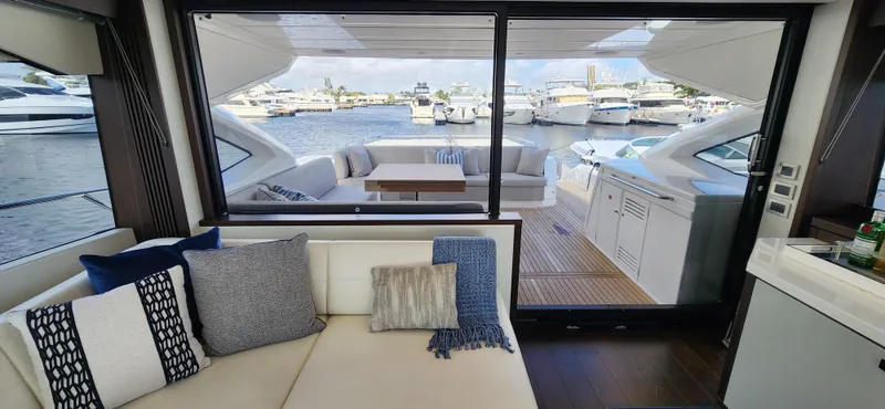 Slide: The Image of Interior view of 2020 Sunseeker Predator 74 XPS yacht with marina in background. - 28