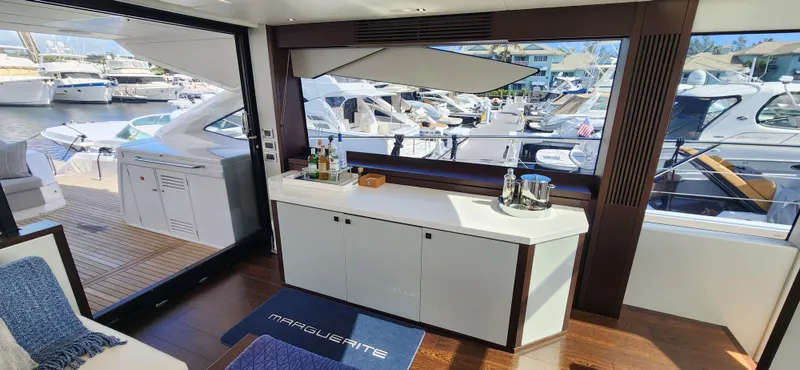Slide: The Image of Interior of 2020 Sunseeker Predator 74 XPS yacht with marina view. - 29