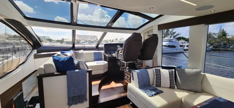 Slide: The Image of Interior of 2020 Sunseeker Predator 74 XPS yacht with luxurious seating and panoramic windows. - 30