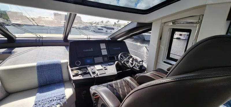 Slide: The Image of Interior helm of 2020 Sunseeker Predator 74 XPS yacht with modern controls and seating. - 33