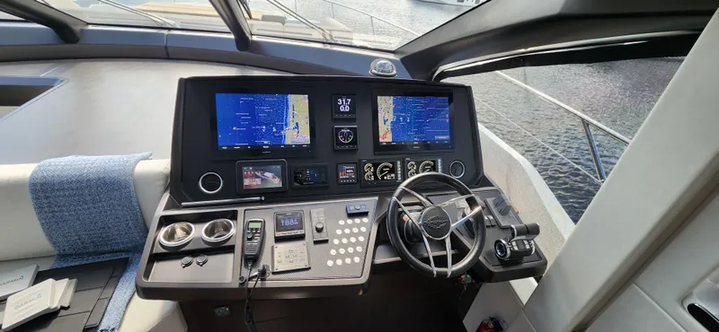Slide: The Image of Cockpit of 2020 Sunseeker Predator 74 XPS yacht with advanced navigation systems. - 35