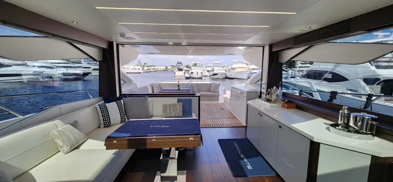 Slide: The Image of Luxurious interior of 2020 Sunseeker Predator 74 XPS yacht with marina view. - 36