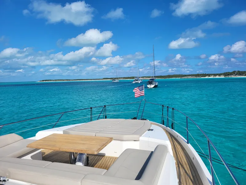 Slide: The Image of Sunseeker Predator 74 XPS 2020 yacht on turquoise waters with clear blue sky. - 4