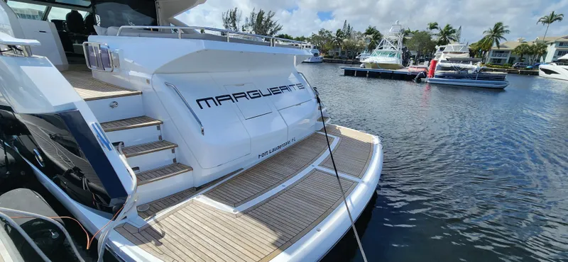 Slide: The Image of 2020 Sunseeker Predator 74 XPS yacht docked at marina. - 43